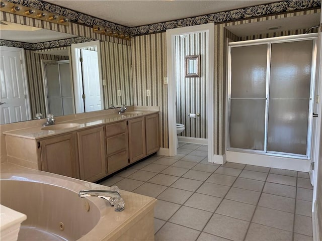 416 Marina Dr, Slidell, LA 70458 - full bathroom featuring a sink, tile patterned floors, toilet, and a shower stall
