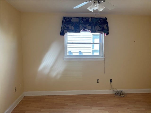 416 Marina Dr, Slidell, LA 70458 - unfurnished room with baseboards, a ceiling fan, and light wood-type flooring