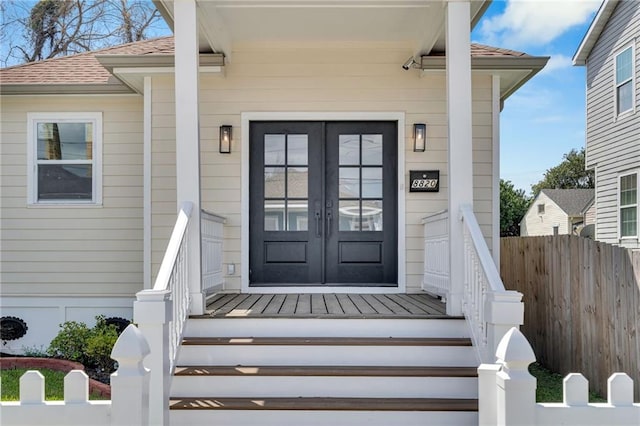 8820 Cohn St, New Orleans, LA 70118 - entrance to property featuring french doors and fence