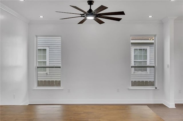8820 Cohn St, New Orleans, LA 70118 - unfurnished room with baseboards, a ceiling fan, wood finished floors, and crown molding