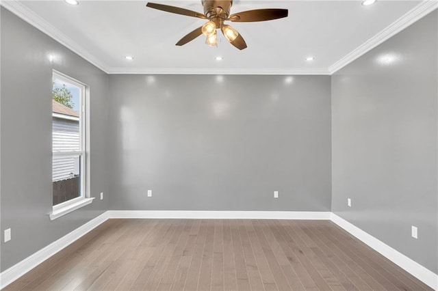 8820 Cohn St, New Orleans, LA 70118 - spare room with ornamental molding, baseboards, ceiling fan, and wood finished floors