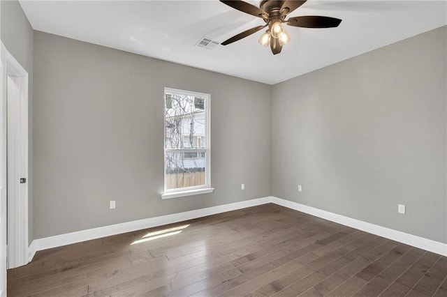 8820 Cohn St, New Orleans, LA 70118 - unfurnished room featuring dark wood-style floors, baseboards, ceiling fan, and visible vents