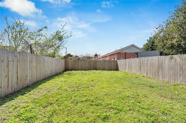 8820 Cohn St, New Orleans, LA 70118 - view of yard featuring a fenced backyard