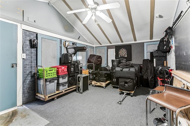 workout area with carpet flooring, vaulted ceiling, and ceiling fan