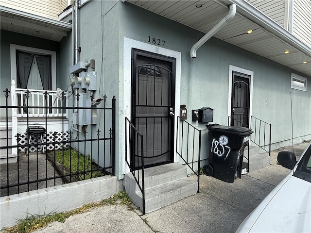 1827 S Rampart St, New Orleans, LA 70113 - property entrance featuring stucco siding