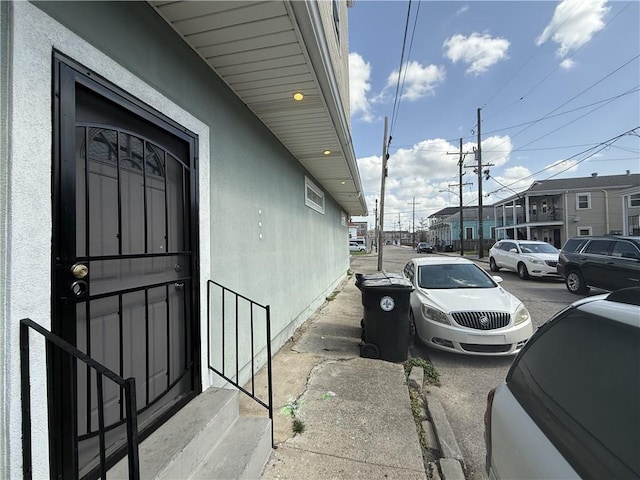 1827 S Rampart St, New Orleans, LA 70113 - entrance to property featuring stucco siding