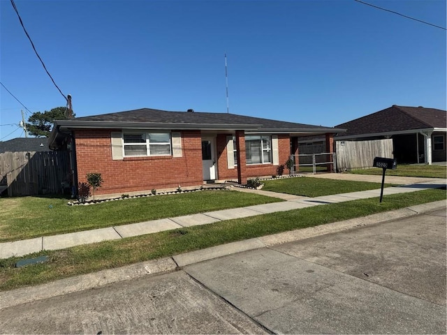 3020 Decomine Dr, Chalmette, LA 70043 - view of front of property with brick siding and concrete driveway