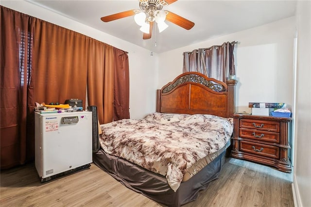 3020 Decomine Dr, Chalmette, LA 70043 - bedroom with light wood finished floors and a ceiling fan