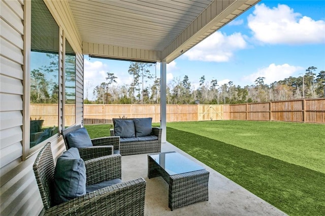 view of patio featuring an outdoor hangout area and a fenced backyard