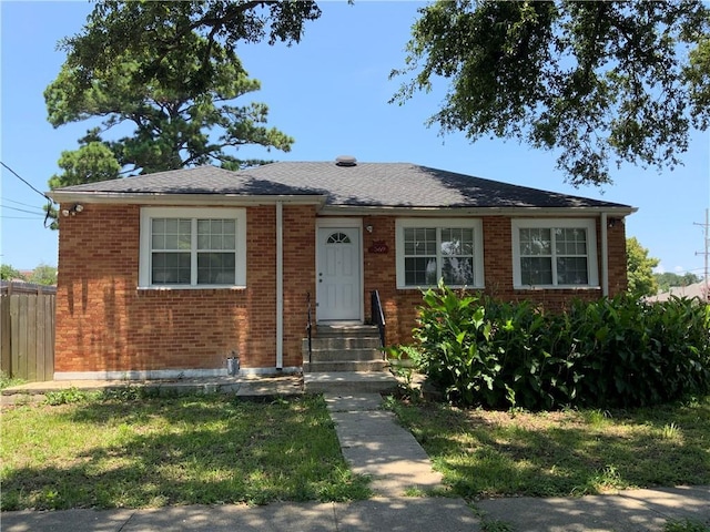 1569 Athis St, New Orleans, LA 70122 - bungalow featuring brick siding