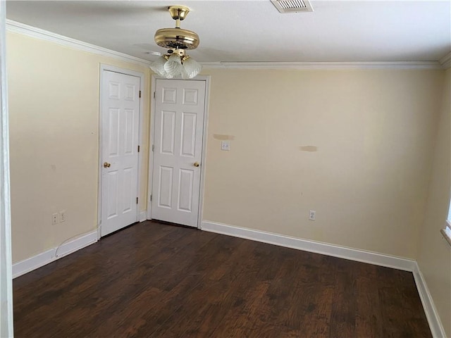 1569 Athis St, New Orleans, LA 70122 - empty room with crown molding, dark wood-style flooring, and a ceiling fan