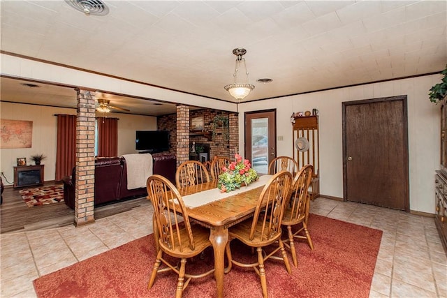 59345 Twin Pines Rd, Bogalusa, LA 70427 - dining room featuring ornate columns, light tile patterned floors, visible vents, and crown molding