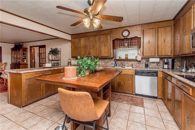 59345 Twin Pines Rd, Bogalusa, LA 70427 - kitchen with backsplash, a peninsula, brown cabinets, and stainless steel dishwasher