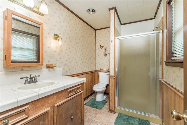 59345 Twin Pines Rd, Bogalusa, LA 70427 - bathroom with a wainscoted wall, visible vents, ornamental molding, wallpapered walls, and a stall shower
