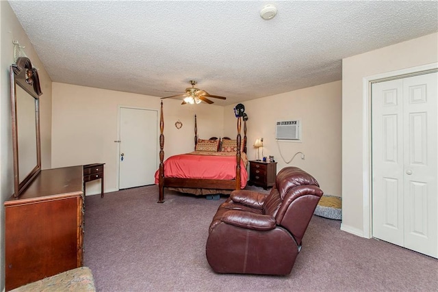 59345 Twin Pines Rd, Bogalusa, LA 70427 - bedroom featuring a ceiling fan, a wall mounted air conditioner, carpet, and a textured ceiling
