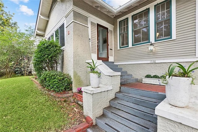 1338 Fern St, New Orleans, LA 70118 - view of side of property with entry steps and a lawn
