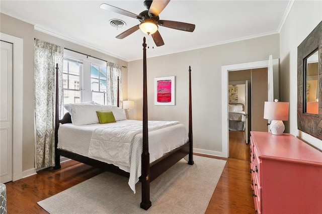 1338 Fern St, New Orleans, LA 70118 - bedroom with wood finished floors, crown molding, baseboards, and a ceiling fan