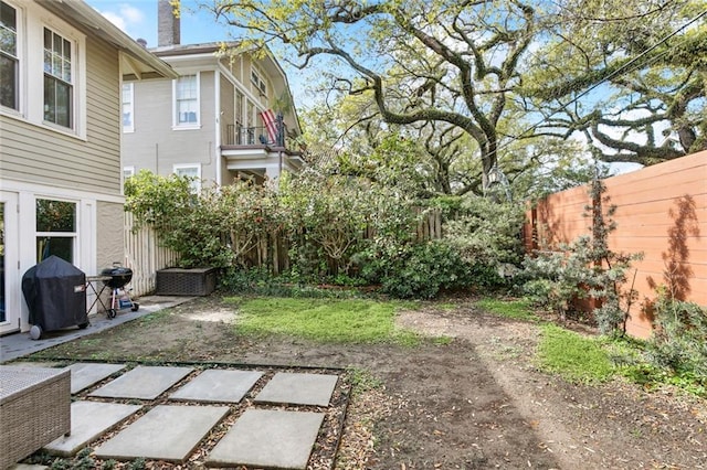 1338 Fern St, New Orleans, LA 70118 - fenced backyard featuring a patio area