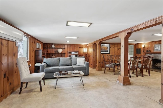 1338 Fern St, New Orleans, LA 70118 - living area with wood walls and a wall unit AC