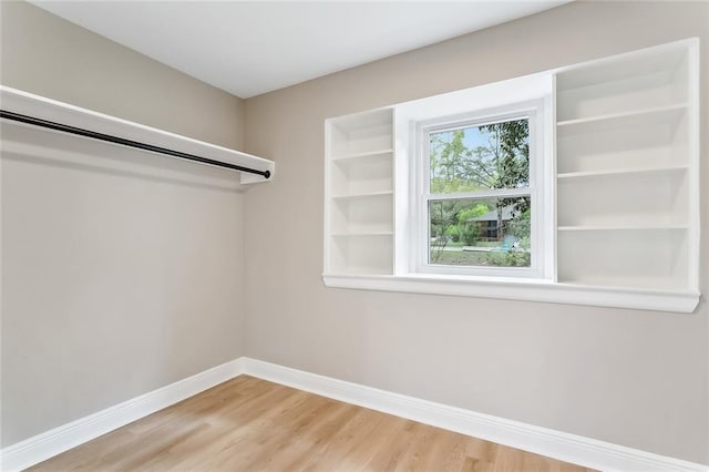 156 Belle Terre Blvd, Covington, LA 70433 - walk in closet with light wood-style floors