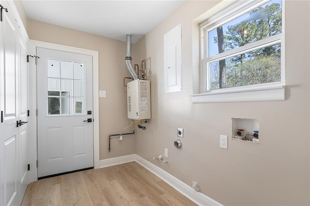 156 Belle Terre Blvd, Covington, LA 70433 - washroom featuring water heater, electric dryer hookup, light wood finished floors, baseboards, and hookup for a gas dryer