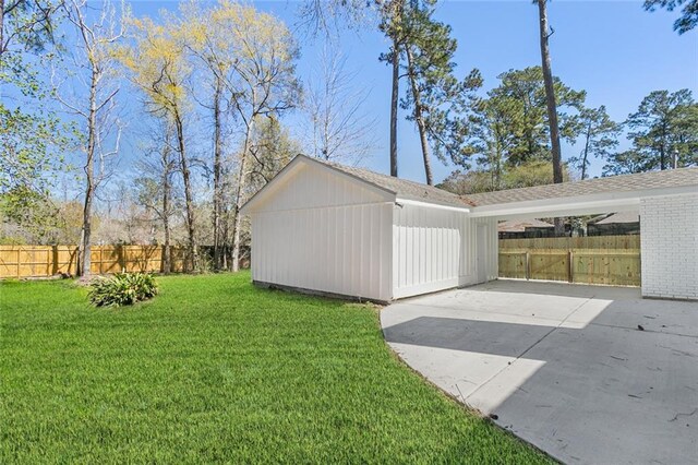 156 Belle Terre Blvd, Covington, LA 70433 - view of yard with an outbuilding, a patio, and driveway