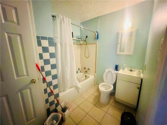 412729 Hollygrove St, New Orleans, LA 70118 - full bathroom with tile patterned floors, toilet, shower / tub combo with curtain, vanity, and a textured ceiling
