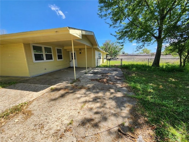 167 Celia Dr, Luling, LA 70070 - exterior space with an attached carport, concrete driveway, a gate, and fence