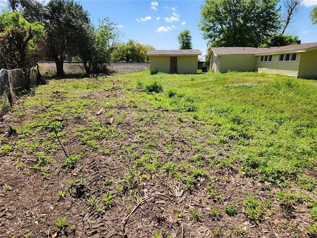 167 Celia Dr, Luling, LA 70070 - view of yard featuring an outbuilding and fence