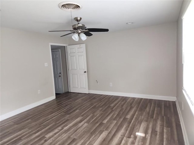 167 Celia Dr, Luling, LA 70070 - spare room with baseboards, dark wood-style floors, visible vents, and ceiling fan