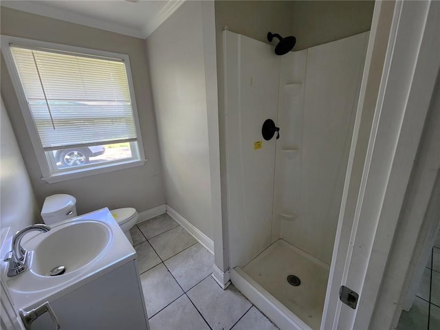 167 Celia Dr, Luling, LA 70070 - full bath featuring crown molding, a shower stall, baseboards, toilet, and tile patterned floors