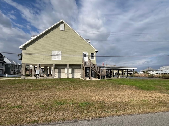 100 Deer Range Ln, Port Sulphur, LA 70083 - rear view of house featuring a yard and stairs