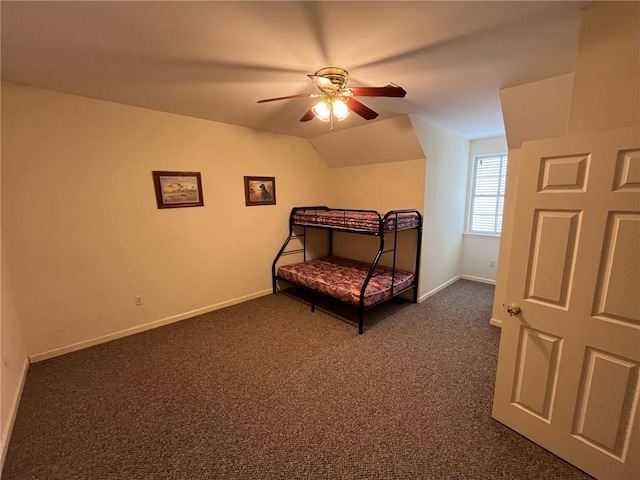 100 Deer Range Ln, Port Sulphur, LA 70083 - bedroom featuring baseboards, ceiling fan, lofted ceiling, and dark colored carpet