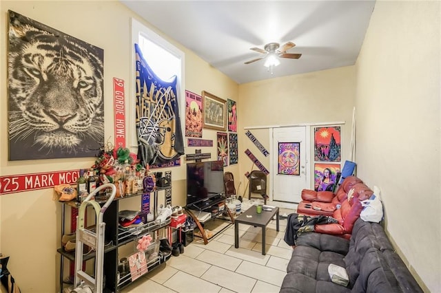 1983 Law St, New Orleans, LA 70119 - living area with a ceiling fan and tile patterned floors