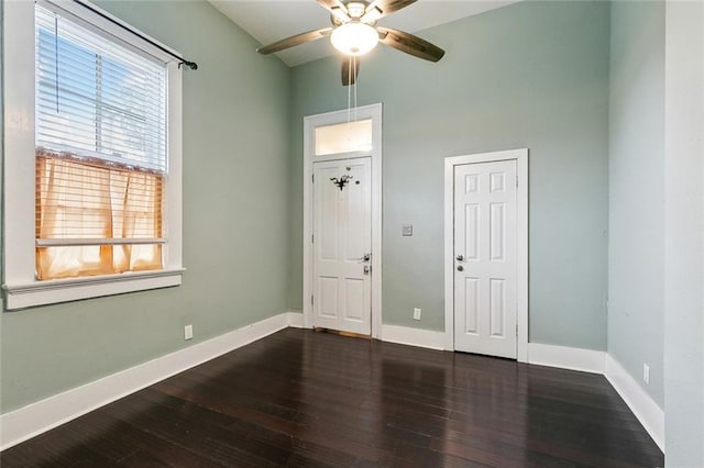 2725 Philip St, New Orleans, LA 70113 - spare room with baseboards, wood finished floors, and ceiling fan