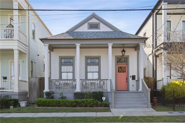 125 Elmira Ave, New Orleans, LA 70114 - view of front facade featuring covered porch and roof with shingles