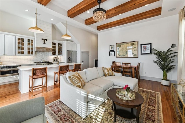 125 Elmira Ave, New Orleans, LA 70114 - living room with recessed lighting, beam ceiling, and wood finished floors