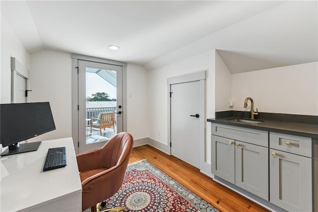 125 Elmira Ave, New Orleans, LA 70114 - office area featuring light wood finished floors, vaulted ceiling, and recessed lighting