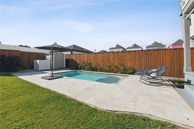 125 Elmira Ave, New Orleans, LA 70114 - view of swimming pool featuring a patio, a fenced backyard, and a storage shed