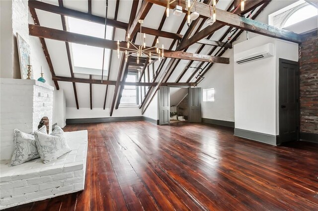 516 Governor Nicholls St Unit 401, New Orleans, LA 70116 - additional living space with wood-type flooring, a chandelier, stairs, beamed ceiling, and a wall mounted AC