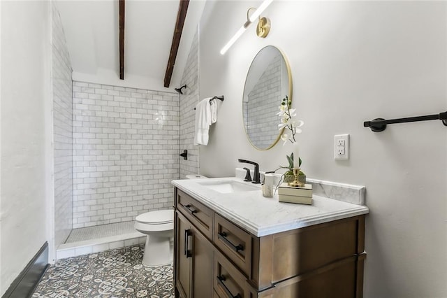 516 Governor Nicholls St Unit 401, New Orleans, LA 70116 - bathroom with beam ceiling, tile patterned flooring, vanity, toilet, and tiled shower