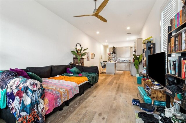 4235 Tulane Ave, New Orleans, LA 70119 - bedroom with light wood finished floors, recessed lighting, ensuite bathroom, and ceiling fan