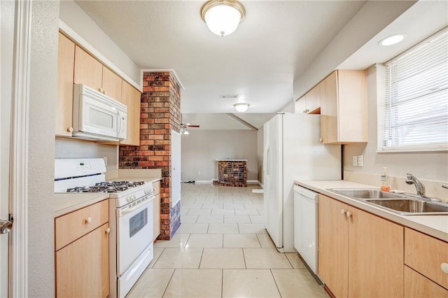 3800 Decomine Dr, Chalmette, LA 70043 - kitchen featuring a sink, light brown cabinetry, and white appliances