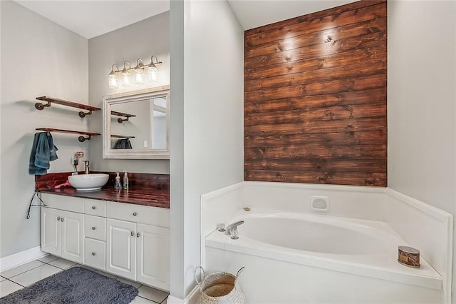 80055 Rollo Rd, Bush, LA 70431 - full bathroom with tile patterned floors, vanity, and a bath