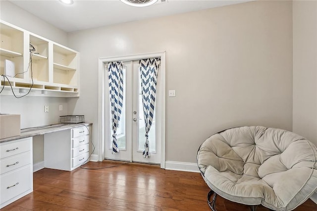 80055 Rollo Rd, Bush, LA 70431 - office space featuring french doors, built in desk, dark wood-style floors, and baseboards