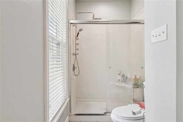 80055 Rollo Rd, Bush, LA 70431 - bathroom with toilet, tile patterned floors, and a shower stall