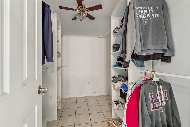 80055 Rollo Rd, Bush, LA 70431 - walk in closet with ceiling fan and tile patterned flooring
