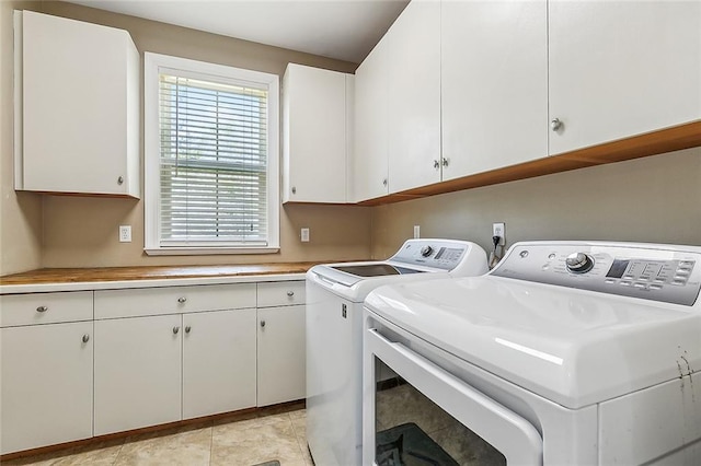 80055 Rollo Rd, Bush, LA 70431 - laundry room featuring washing machine and dryer and cabinet space