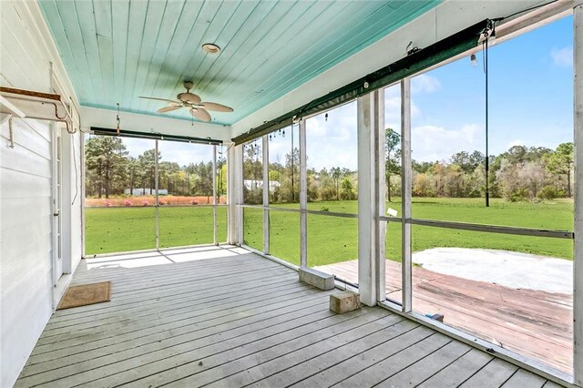 80055 Rollo Rd, Bush, LA 70431 - unfurnished sunroom featuring a ceiling fan