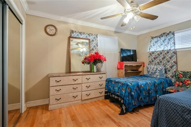 4529 Citrus Dr, New Orleans, LA 70127 - bedroom featuring light wood-style flooring, baseboards, ornamental molding, and a ceiling fan